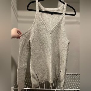 light-gray open shoulder sweater with front zipper detail